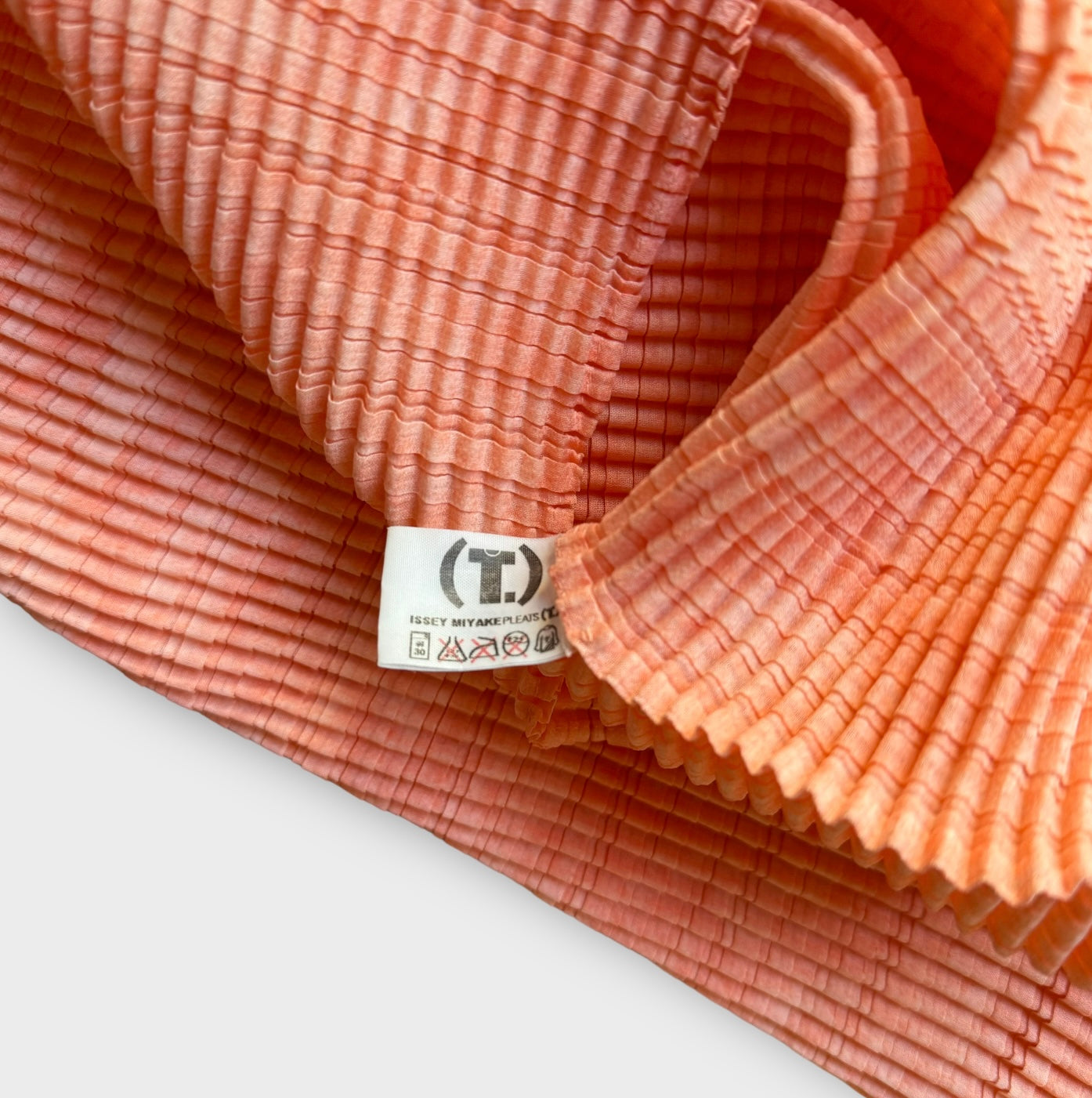 issey miyake orange pleated top