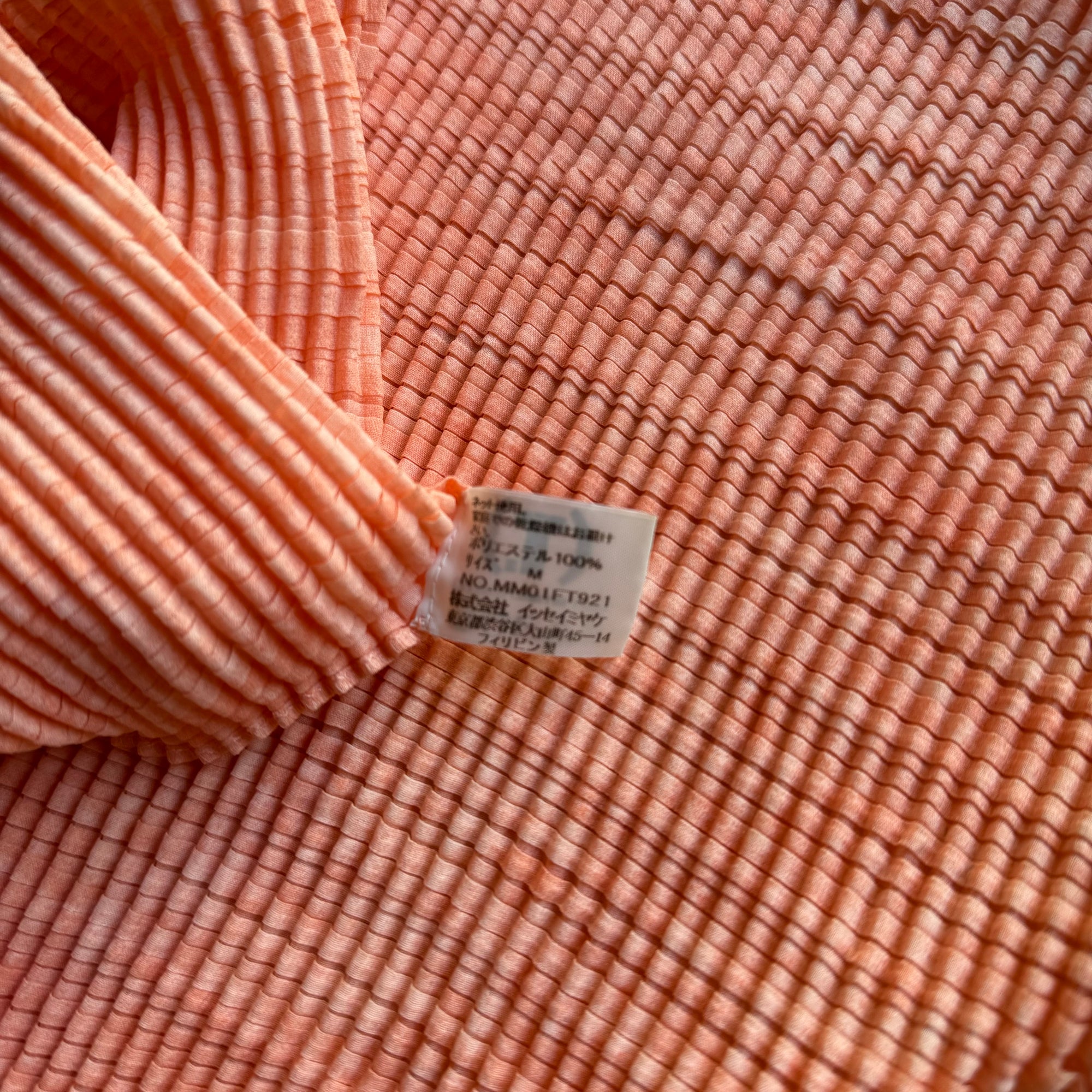 issey miyake orange pleated top