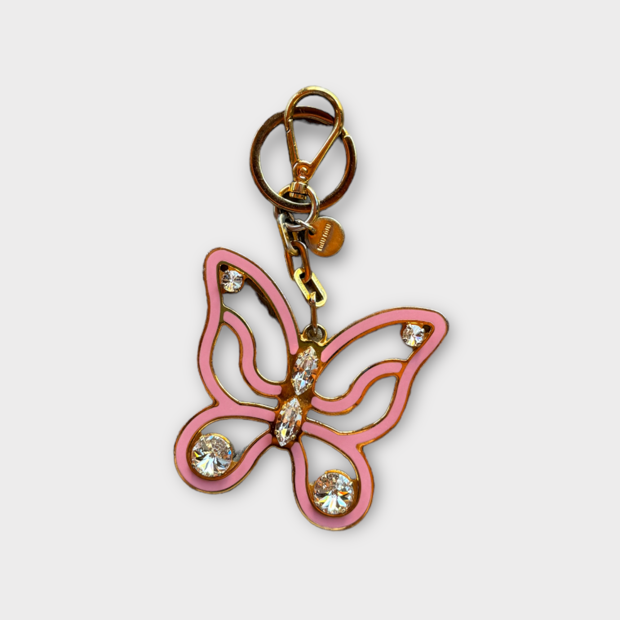 miu miu pink butterfly keychain