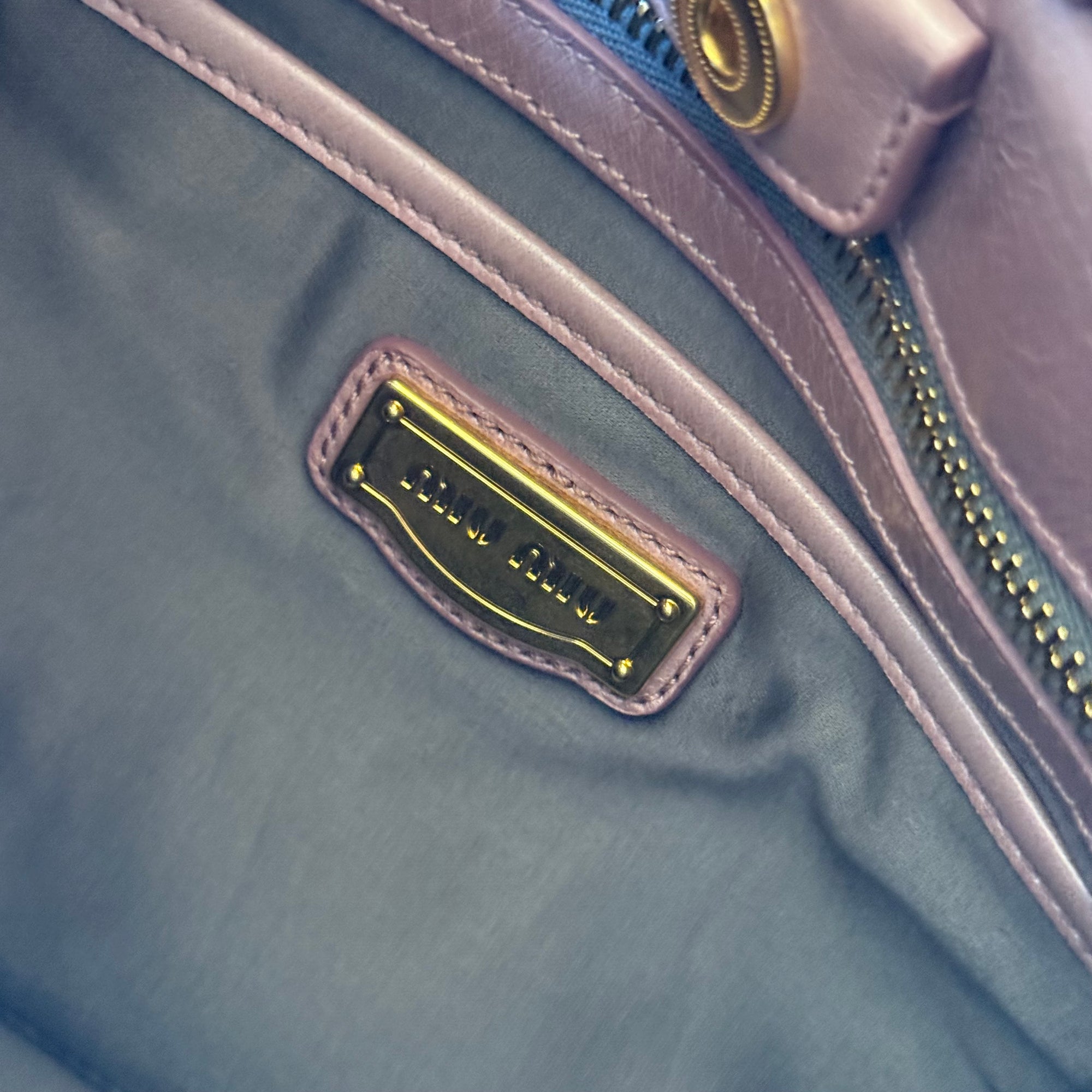 miu miu 2000s purple shoulder bag