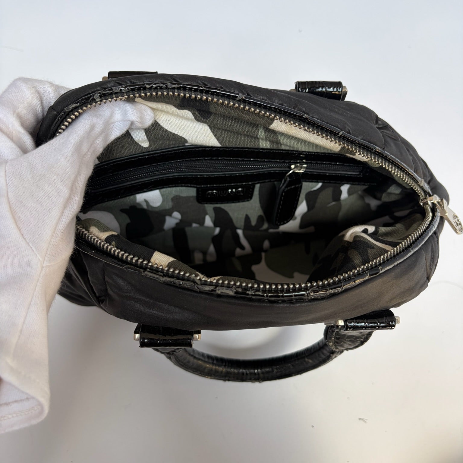 muta 8 black mini puffer bag