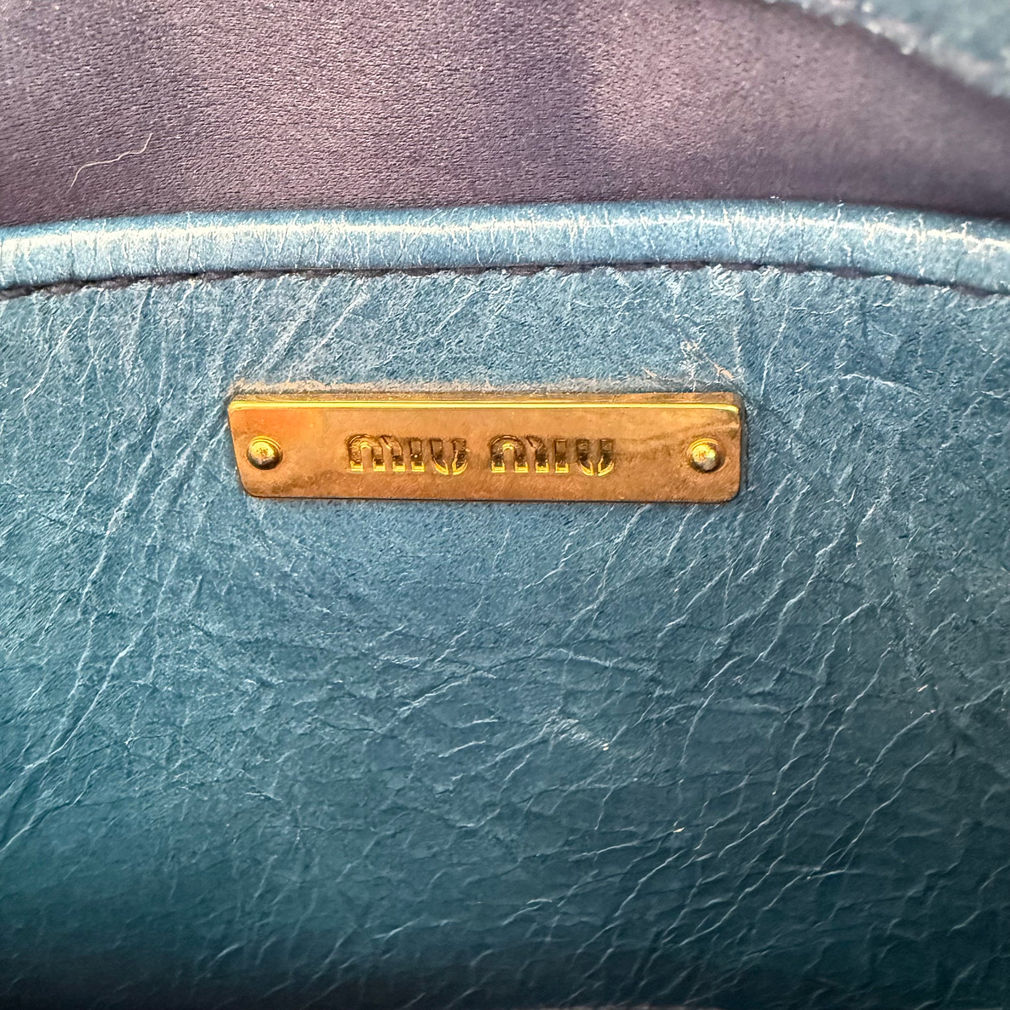 miu miu 2000s blue shoulder bag
