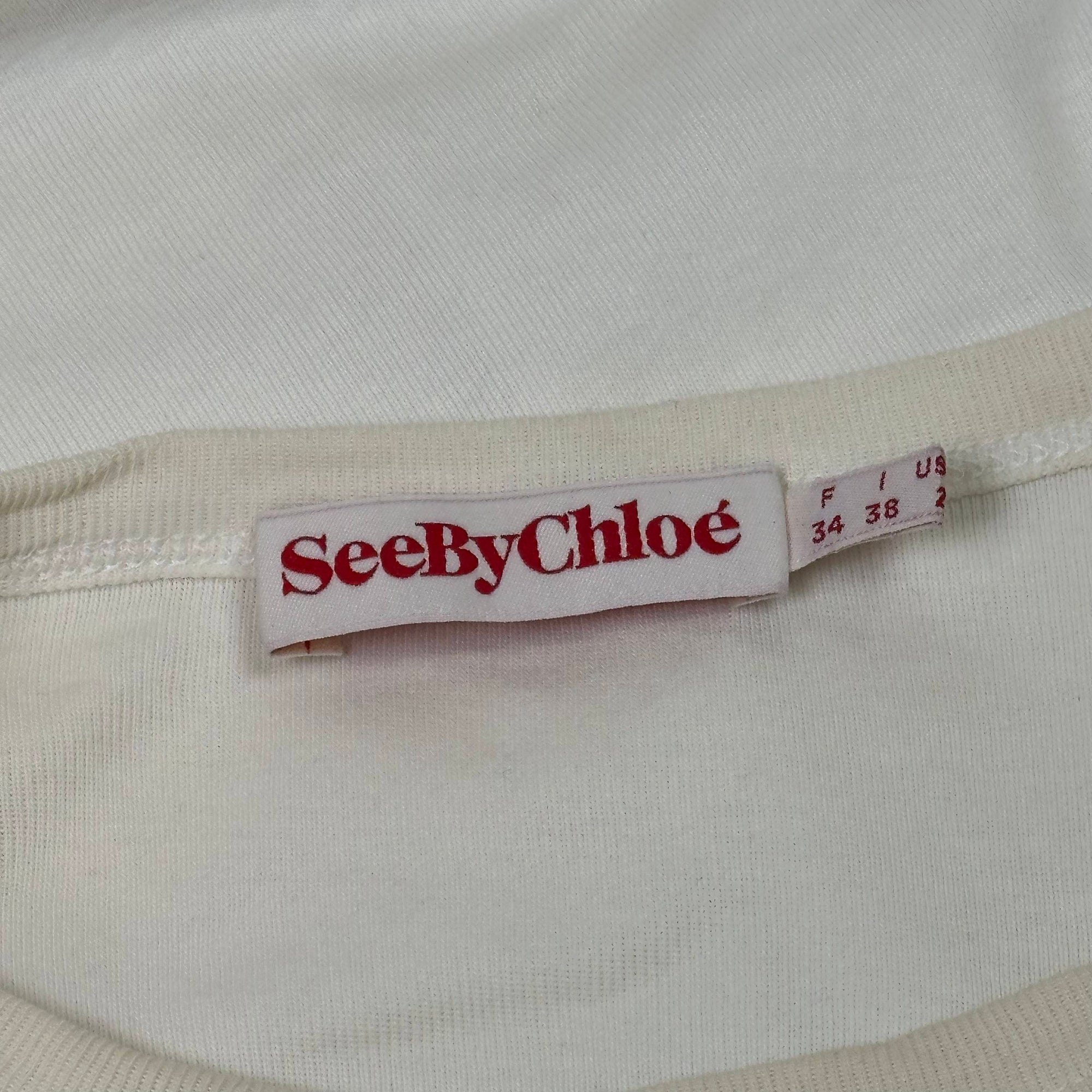 chloé white ruffle top