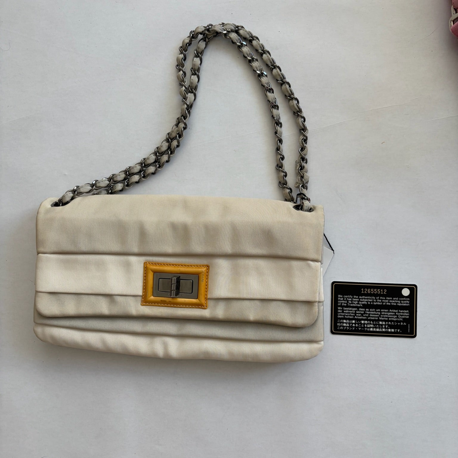 chanel 2000s cream 2.55 flap bag
